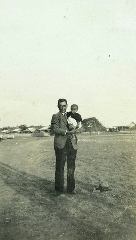 Man and baby at Barambah Aboriginal Settlement c1930