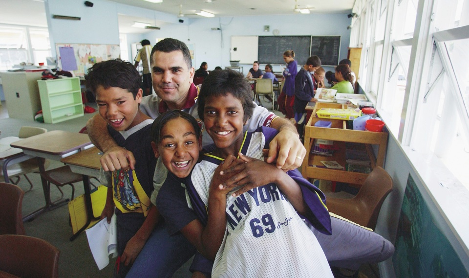 Chris-Sara-and-pupils-at-Cherbourg-State-School_1998