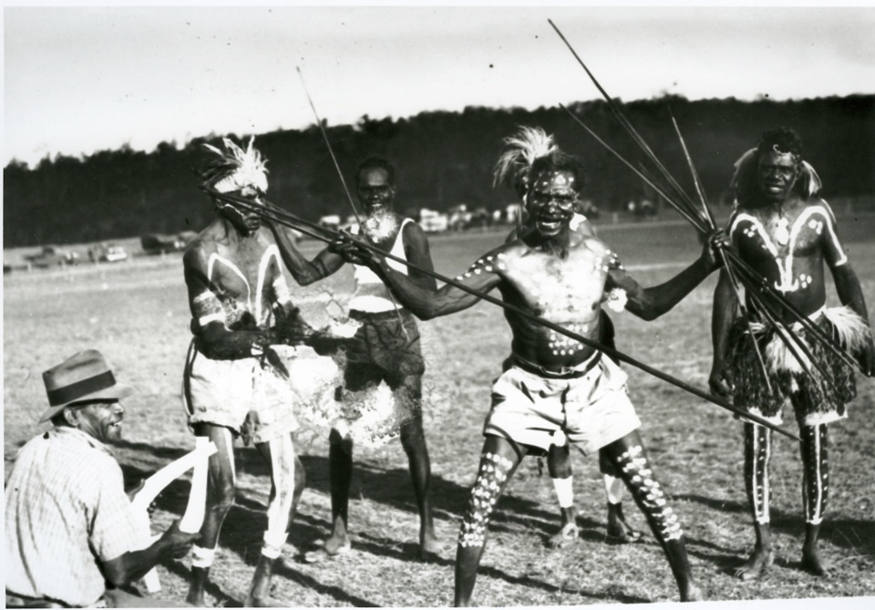 Decorated men dancing at Barambah Aboriginal Settlement c1920
