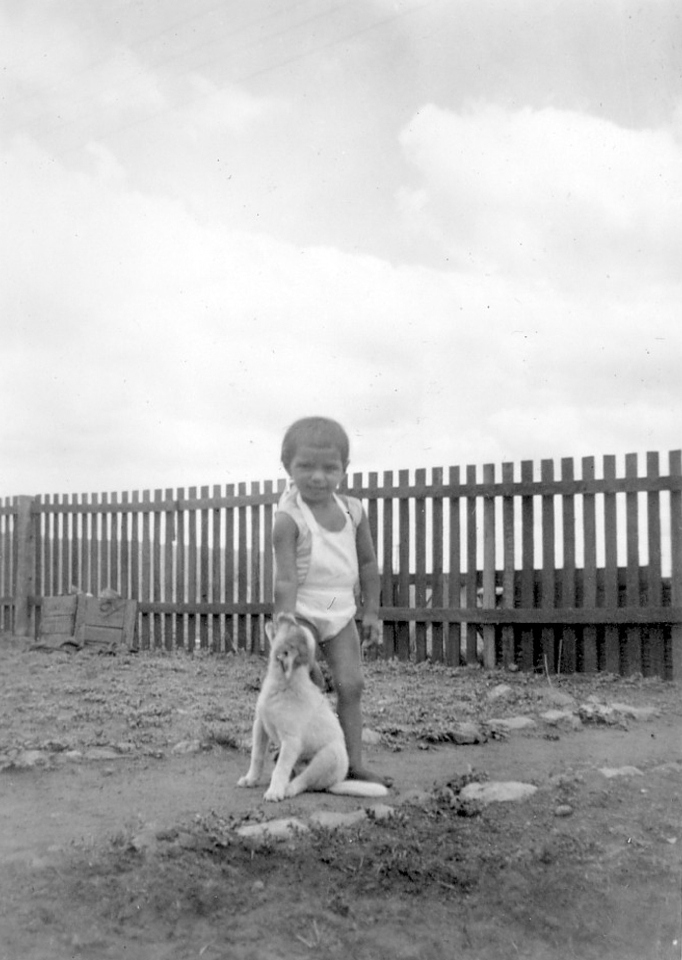 Child with dog at Cherbourg c1930