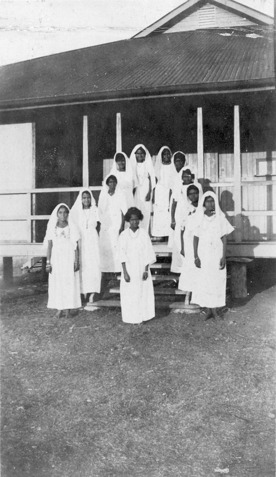 Girls on steps of Welfare Hall at Barambah c1930