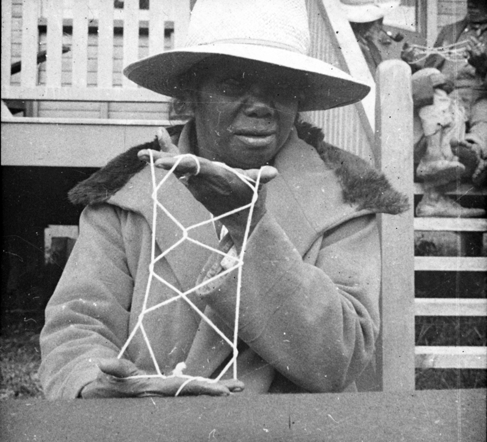 Woman with string design at Cherbourg Aboriginal Settlement 1934
