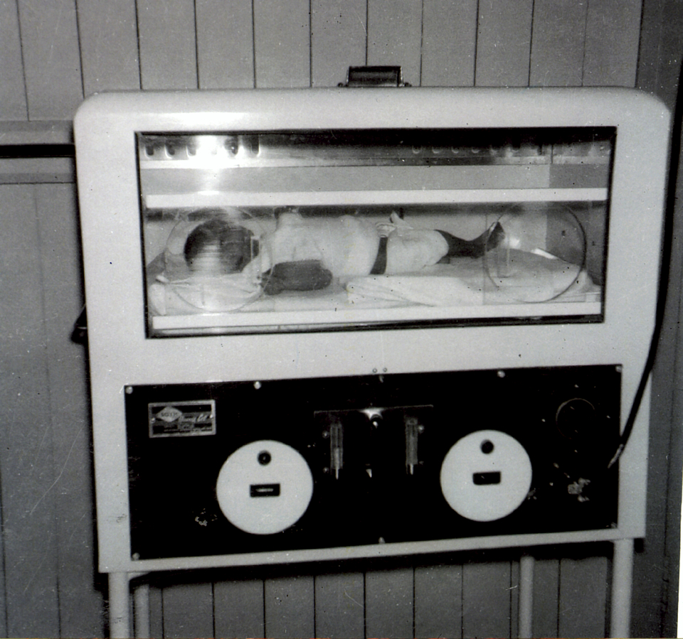 Baby in humidicrib at Cherbourg Hospital c1961