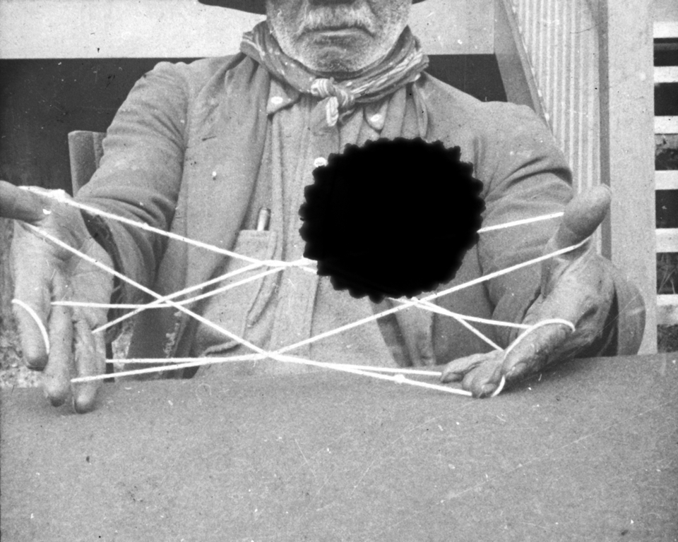 Man with string design at Cherbourg 1934