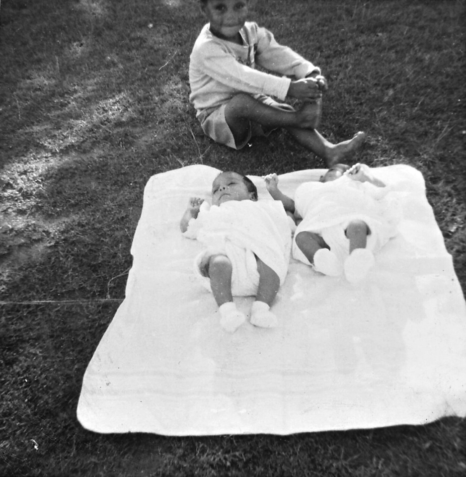 Twins on rug at Cherbourg Hospital c1961