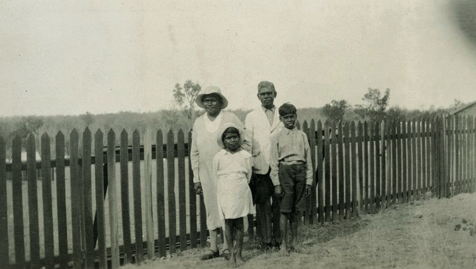 Group in yard at AIM church at Barambah Aboriginal Settlement c1938