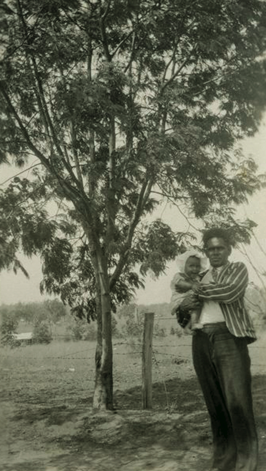 Man and child at Barambah Aboriginal Settlement c1930