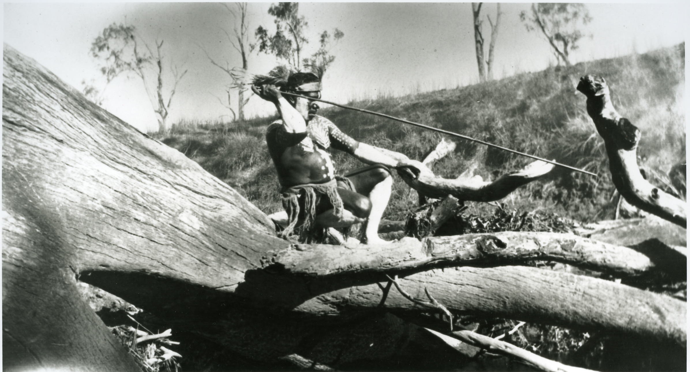 decorated-man-holding-spear-at-barambah-aboriginal-settlement_1920s