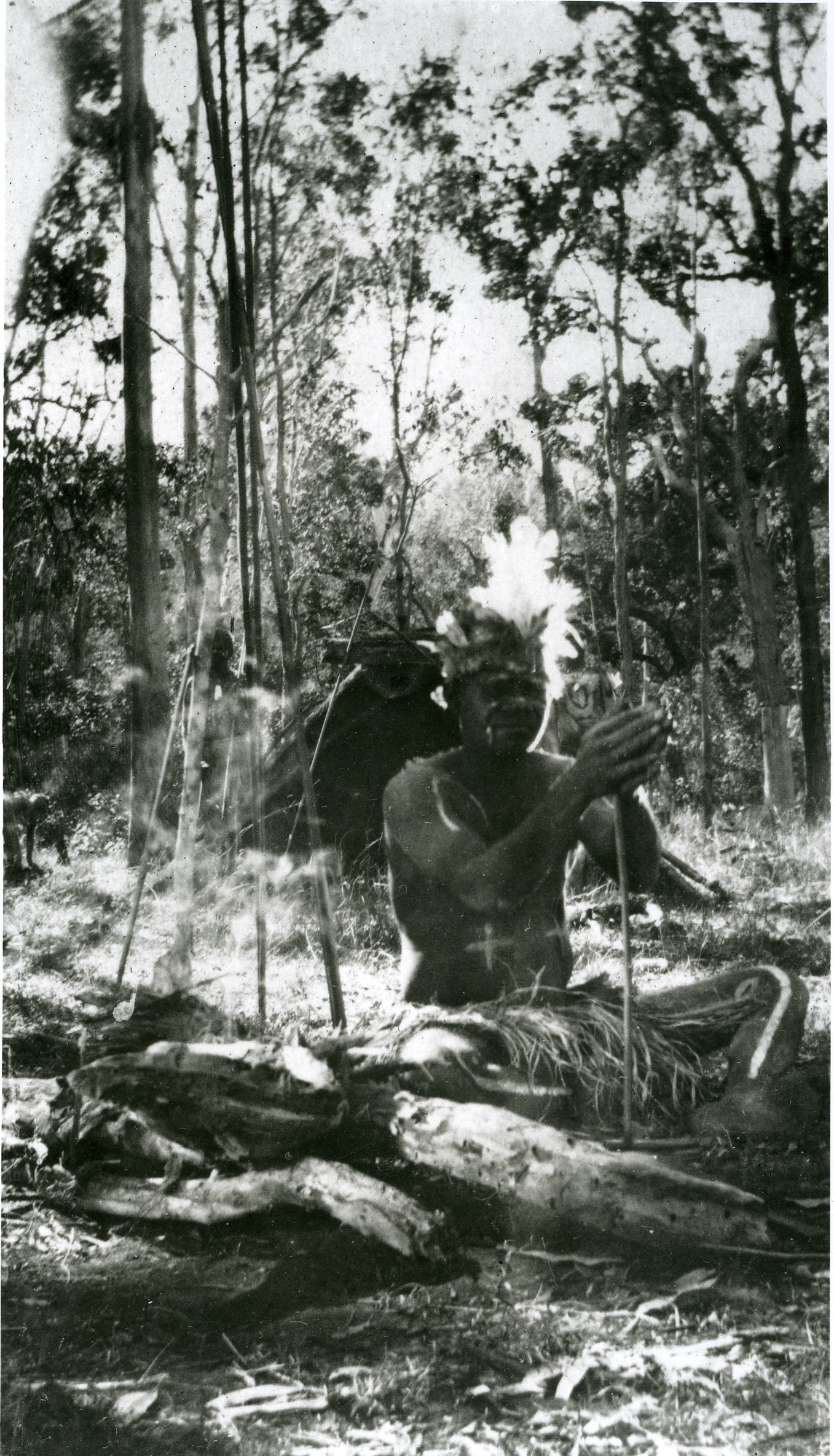 decorated-man-with-fire-sticks-at-barambah-aboriginal-settlement_1920s