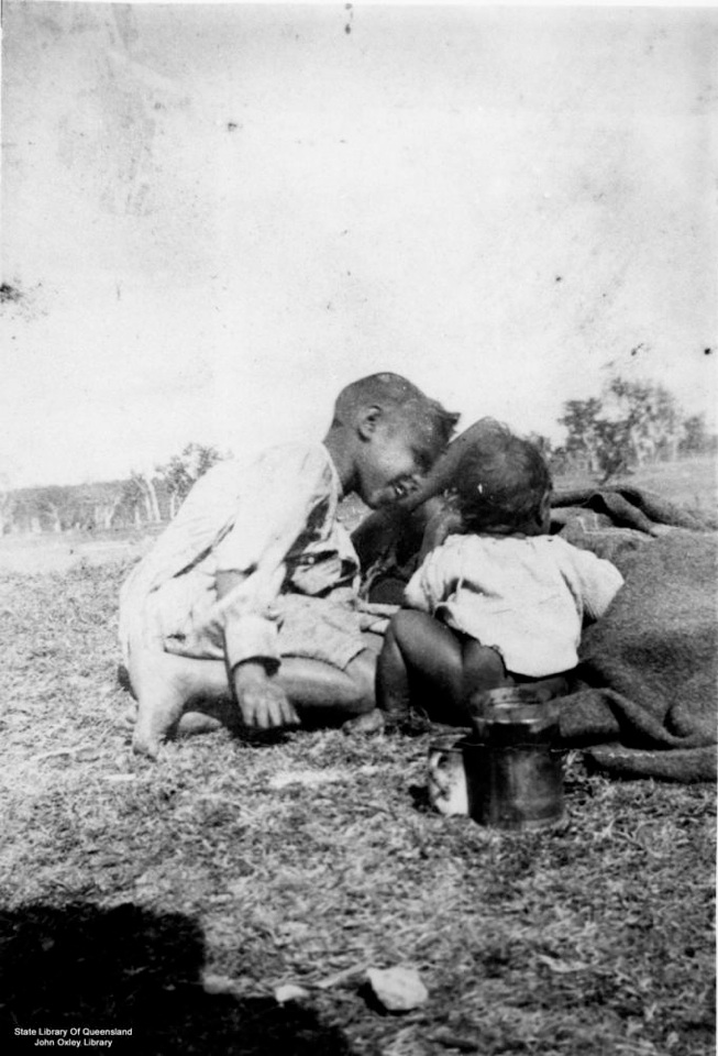 Children with blanket at Barambah Aboriginal Settlement 1905