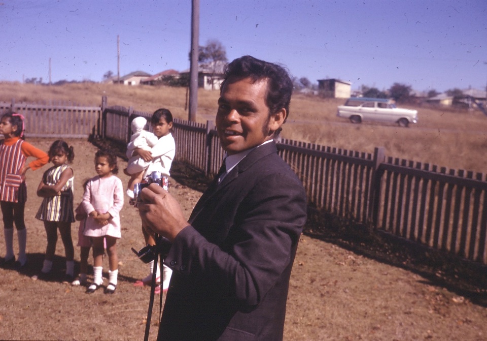 Man with children at AIM Church at Cherbourg c1960