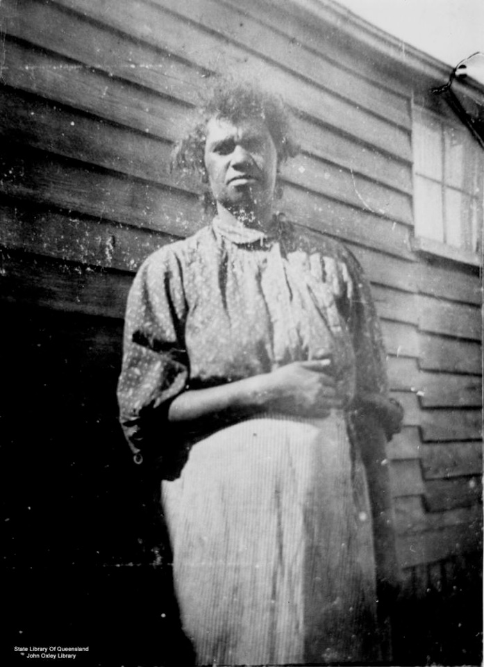 Woman outside building at Barambah Aboriginal Settlement 1905