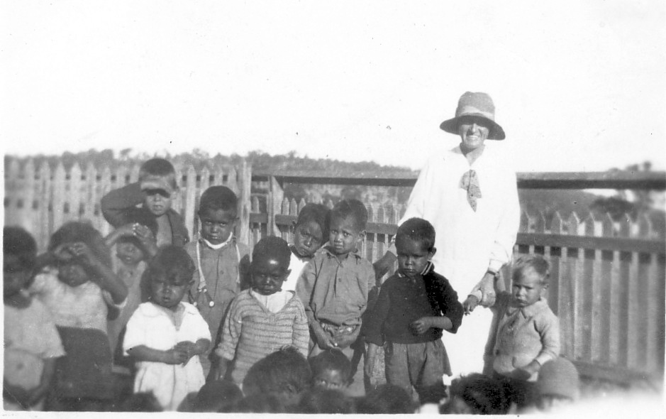 Woman with children at the Boys Dormitory at Cherbourg c1930s